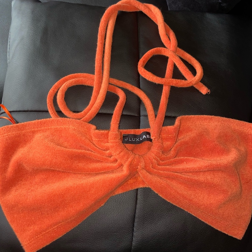 Orange crop top with tie around neck feature